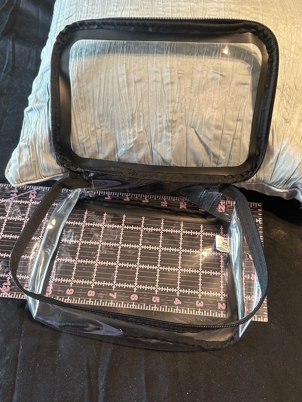 Clear PVC cosmetic/toiletry bag with black trim